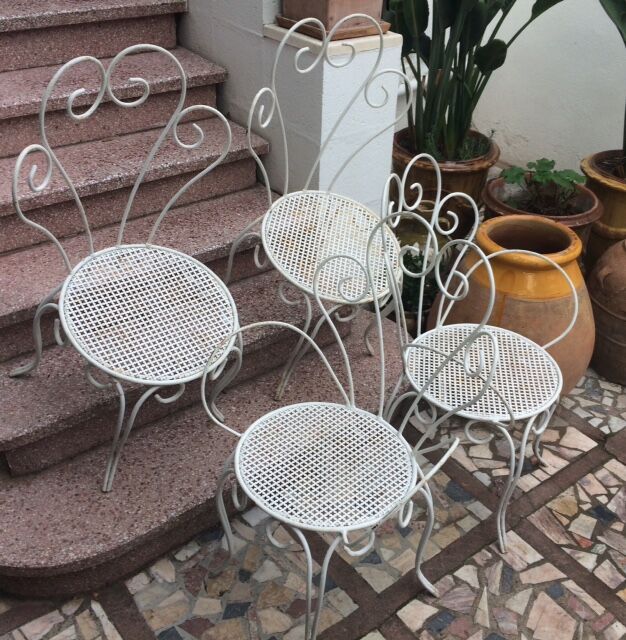 2 armchairs & 2 chairs, wrought iron1950