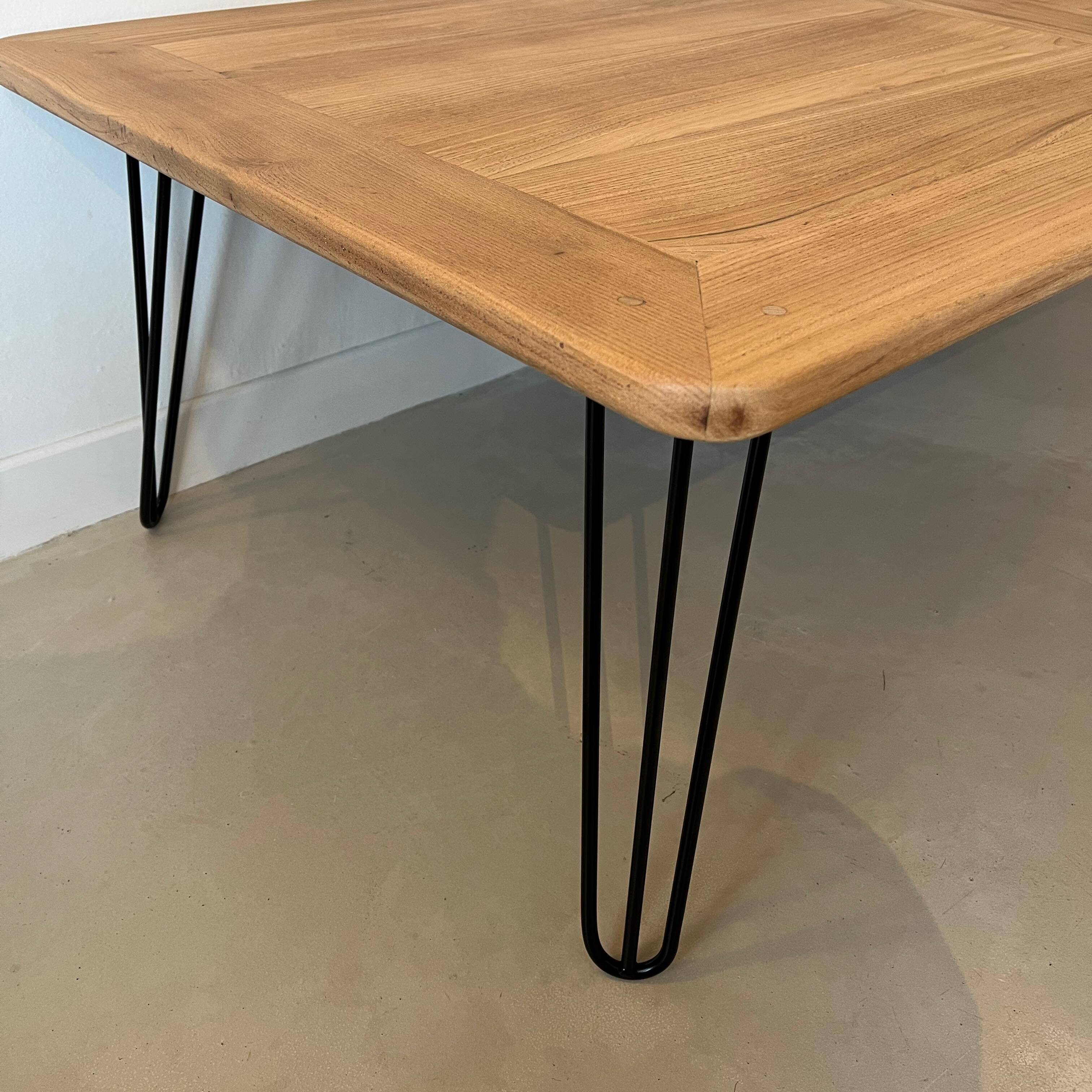 Wooden coffee table with metal legs
