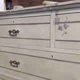 Large patinated chest of drawers