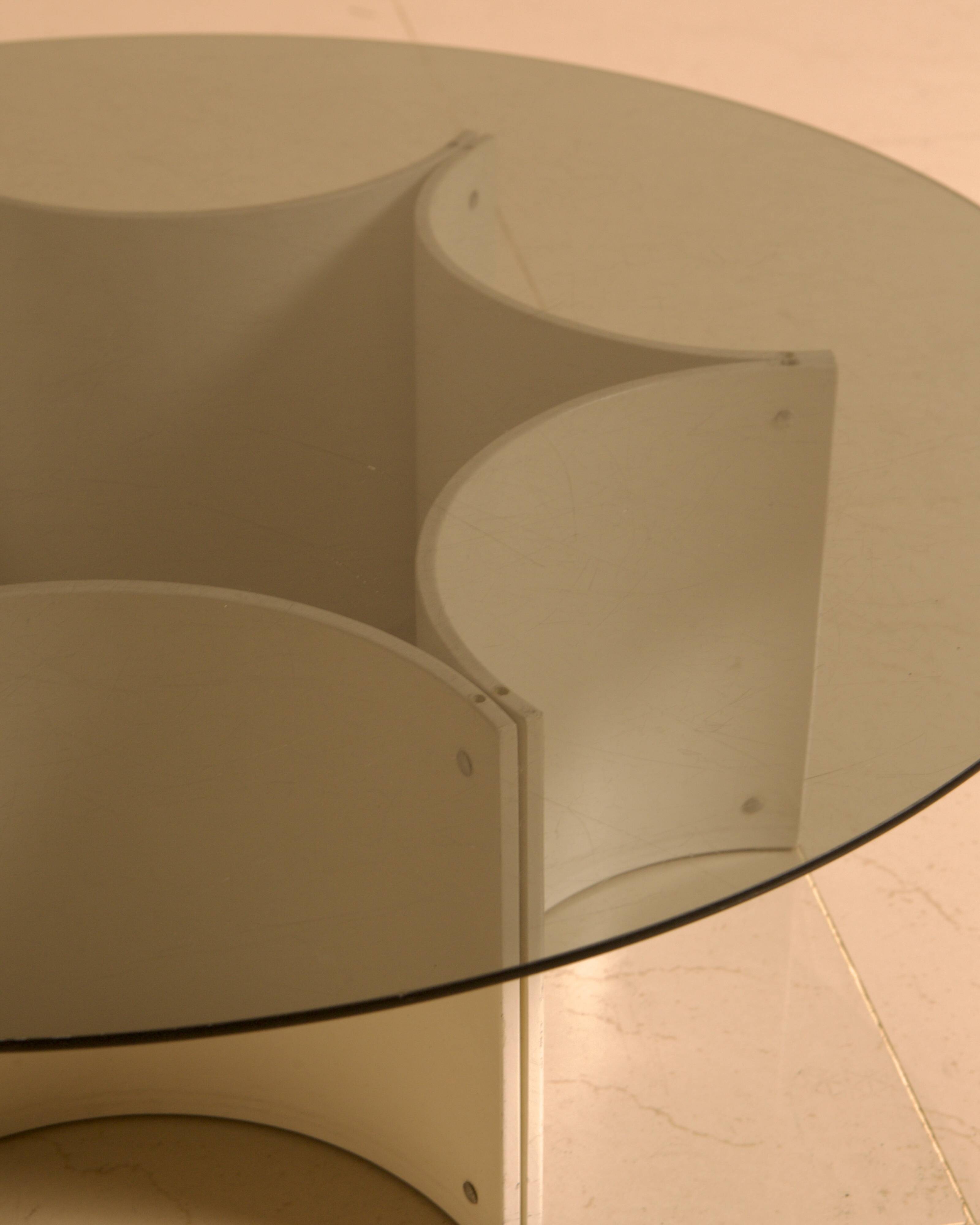 "Space Age" coffee table with star base and smoked glass top from the 70s.