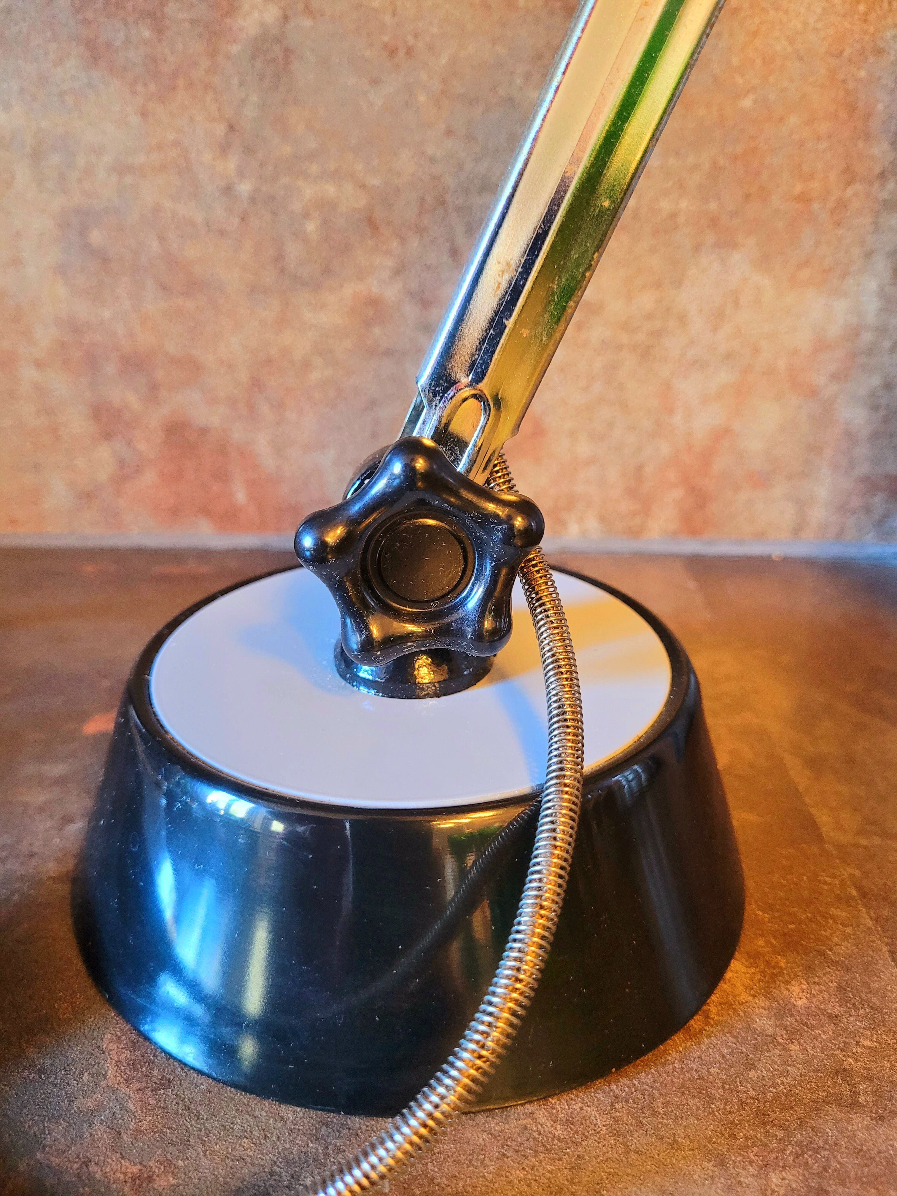 Old gray vintage articulated lamp from the 60s