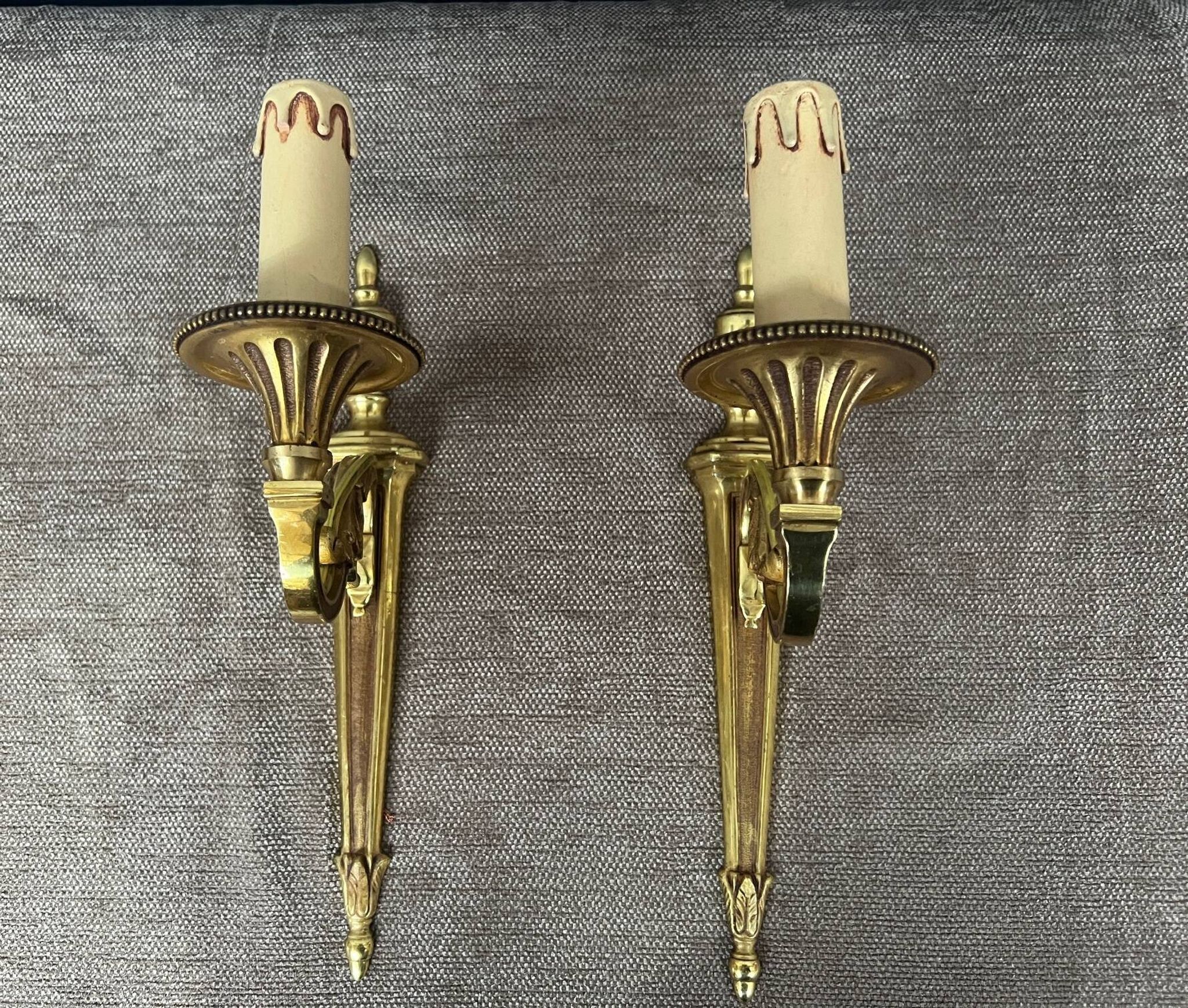 Pair of wall sconces in Louis XVI style. Solid bronze.