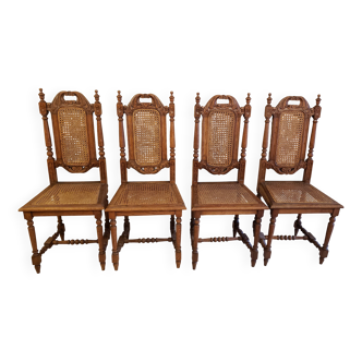 Set of 4 vintage carved cane chairs