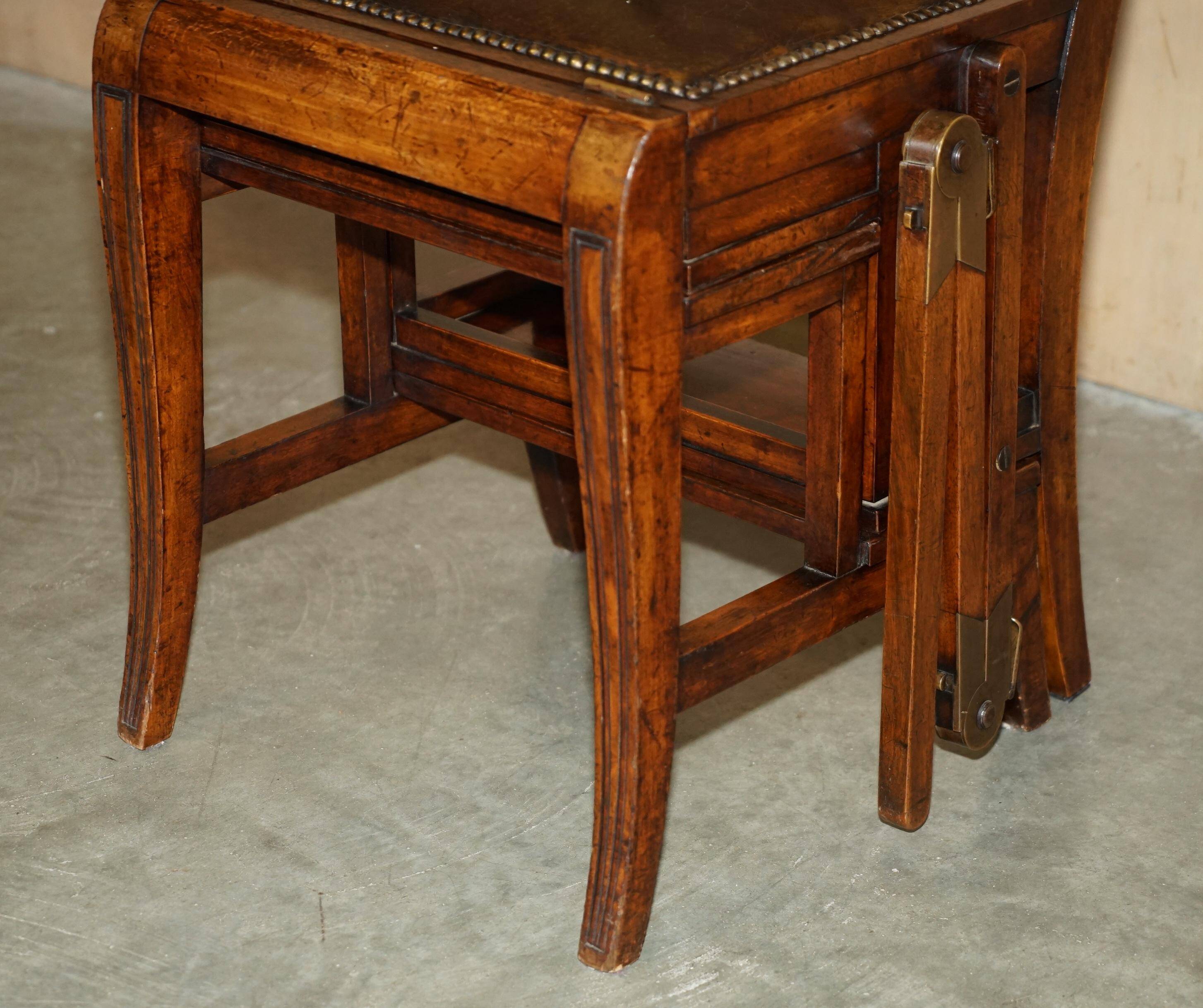 Victorian library chair, convertible, hardwood, leather, brass, circa 1880.