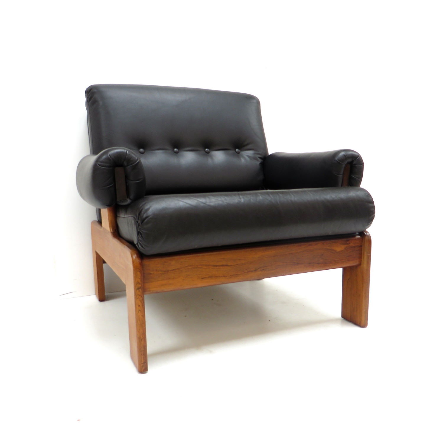 Vintage black leather armchair with solid rosewood frame made in the 1960s