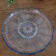 Round blue glass plate