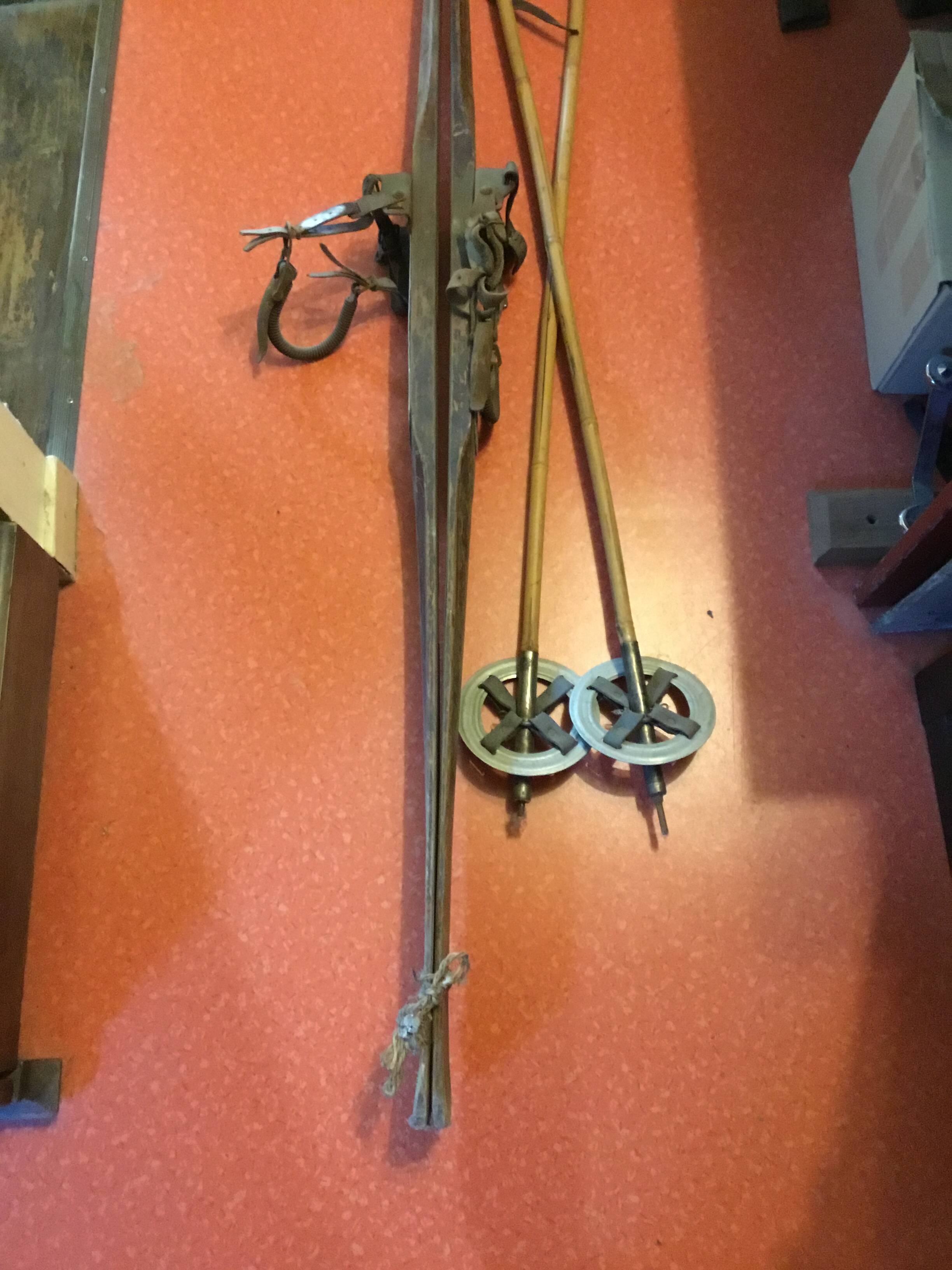 Pair of old skis and poles