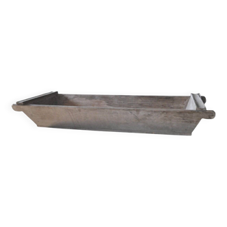 Brown solid wood slicer from the early 20th century — long rustic trough 1890-1919