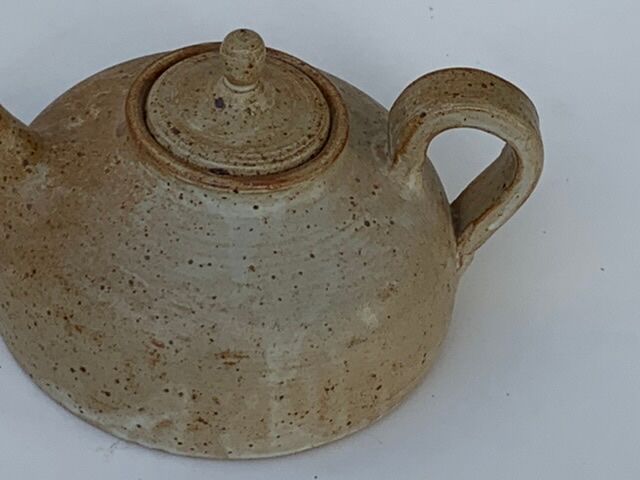 Vintage teapot in reeds