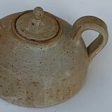 Vintage teapot in reeds