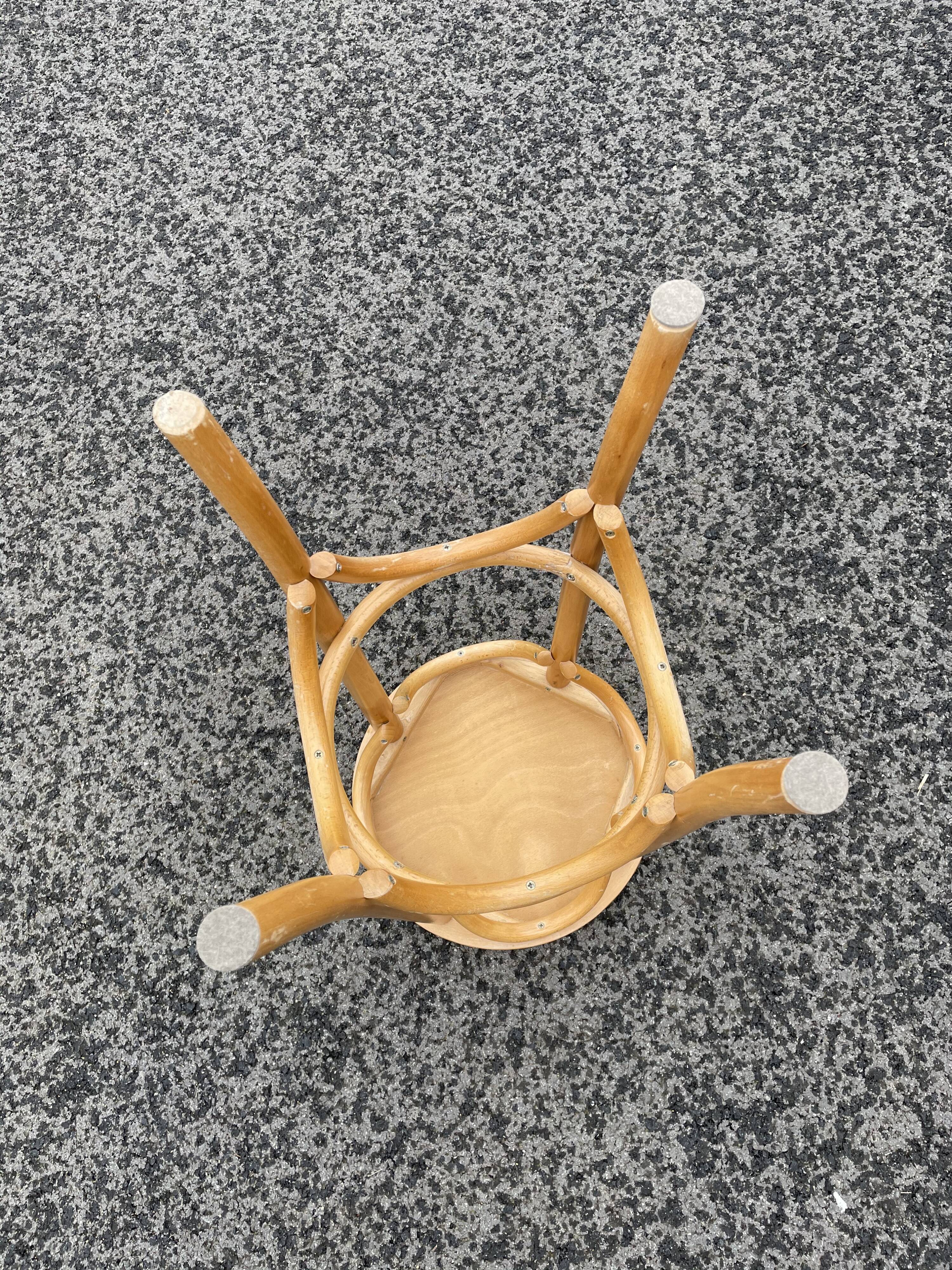 Curved wooden bar stool