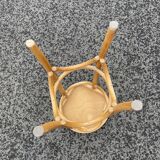 Curved wooden bar stool