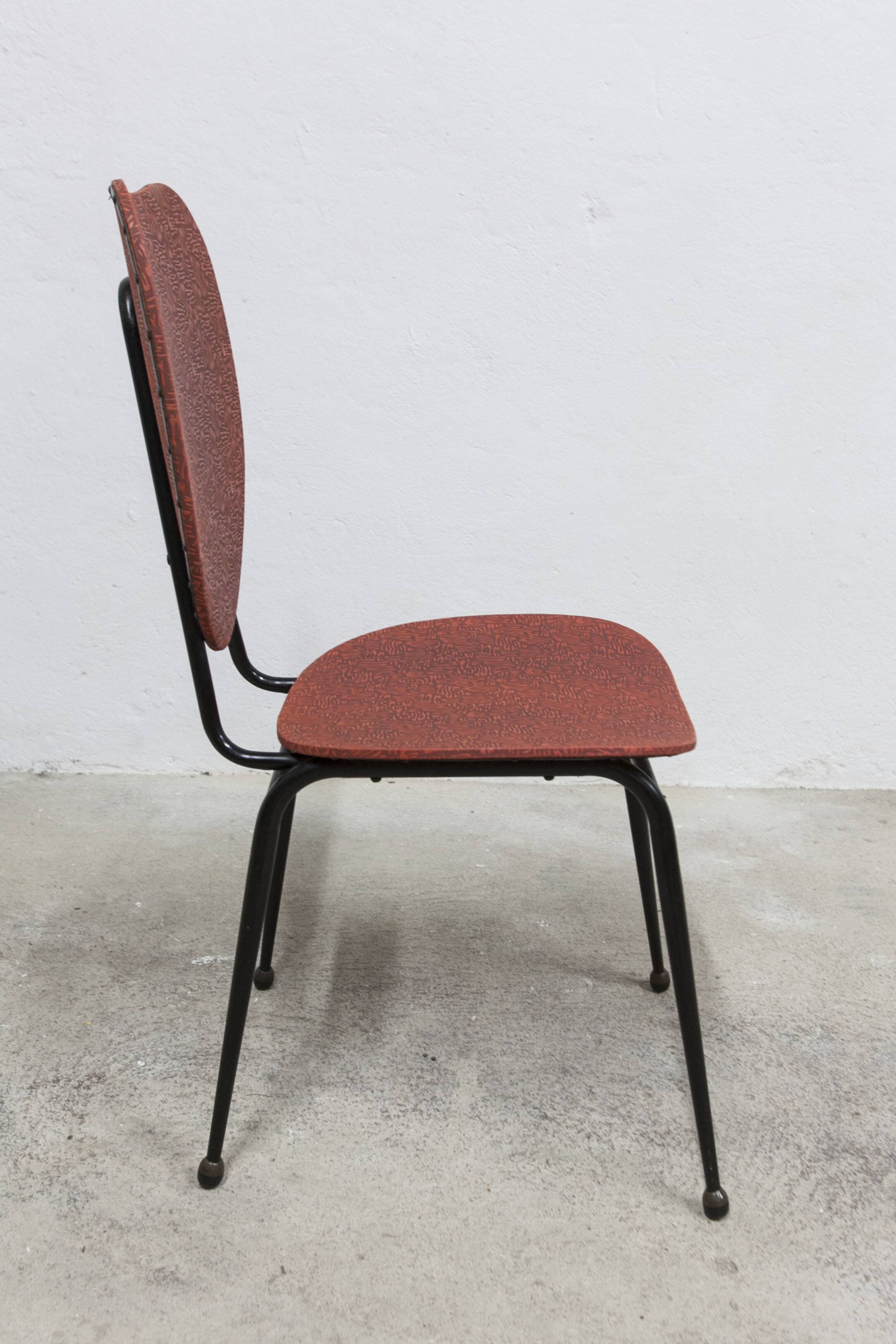 Vintage 70s chair in black lacquered metal and atypical red vinyl