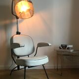 Vintage hairdresser's armchair with helmet transformed into a lamp