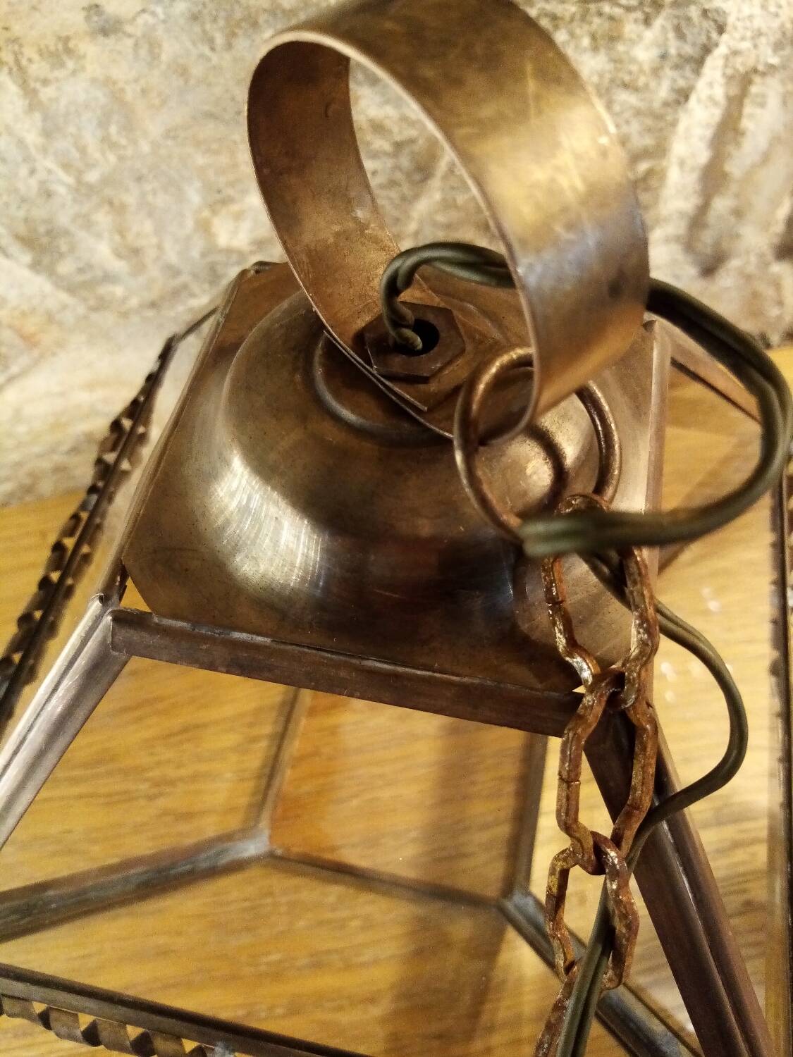 Glass and brass suspension