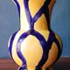 Free-form handmade vase in Art Deco style and period.