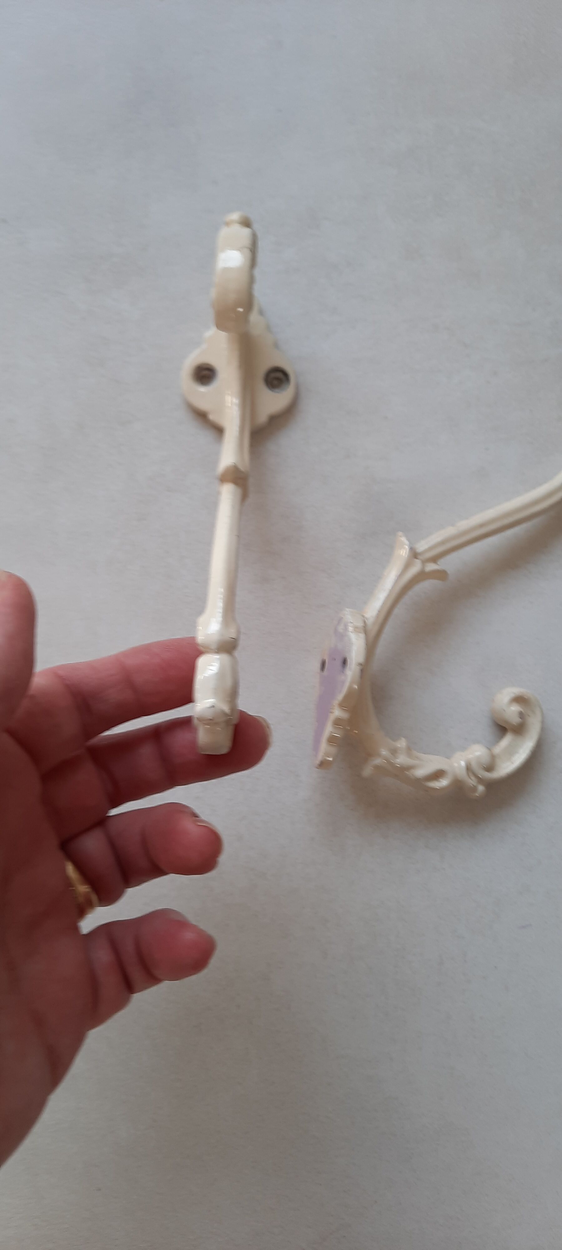 Pateres en fonte