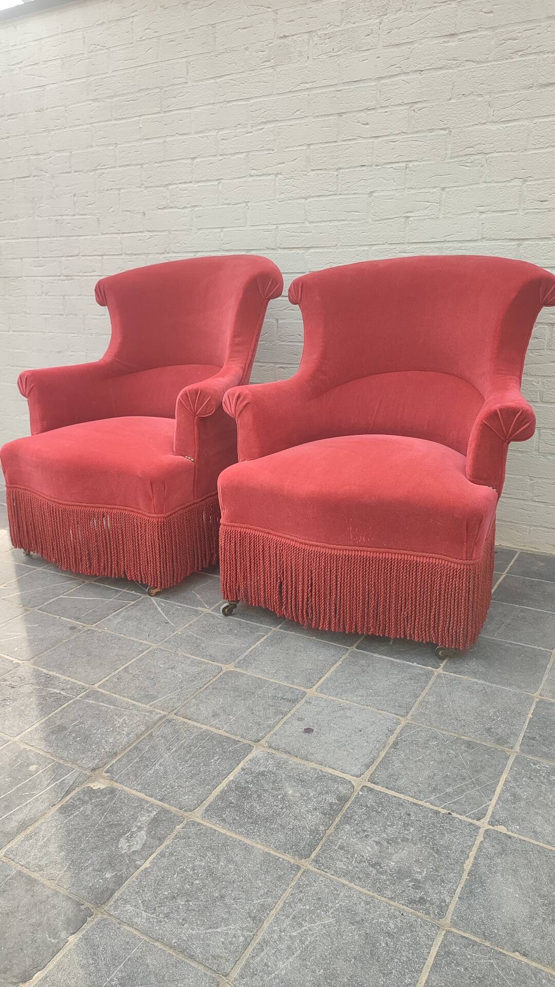 Pair of fringed crapaud armchairs