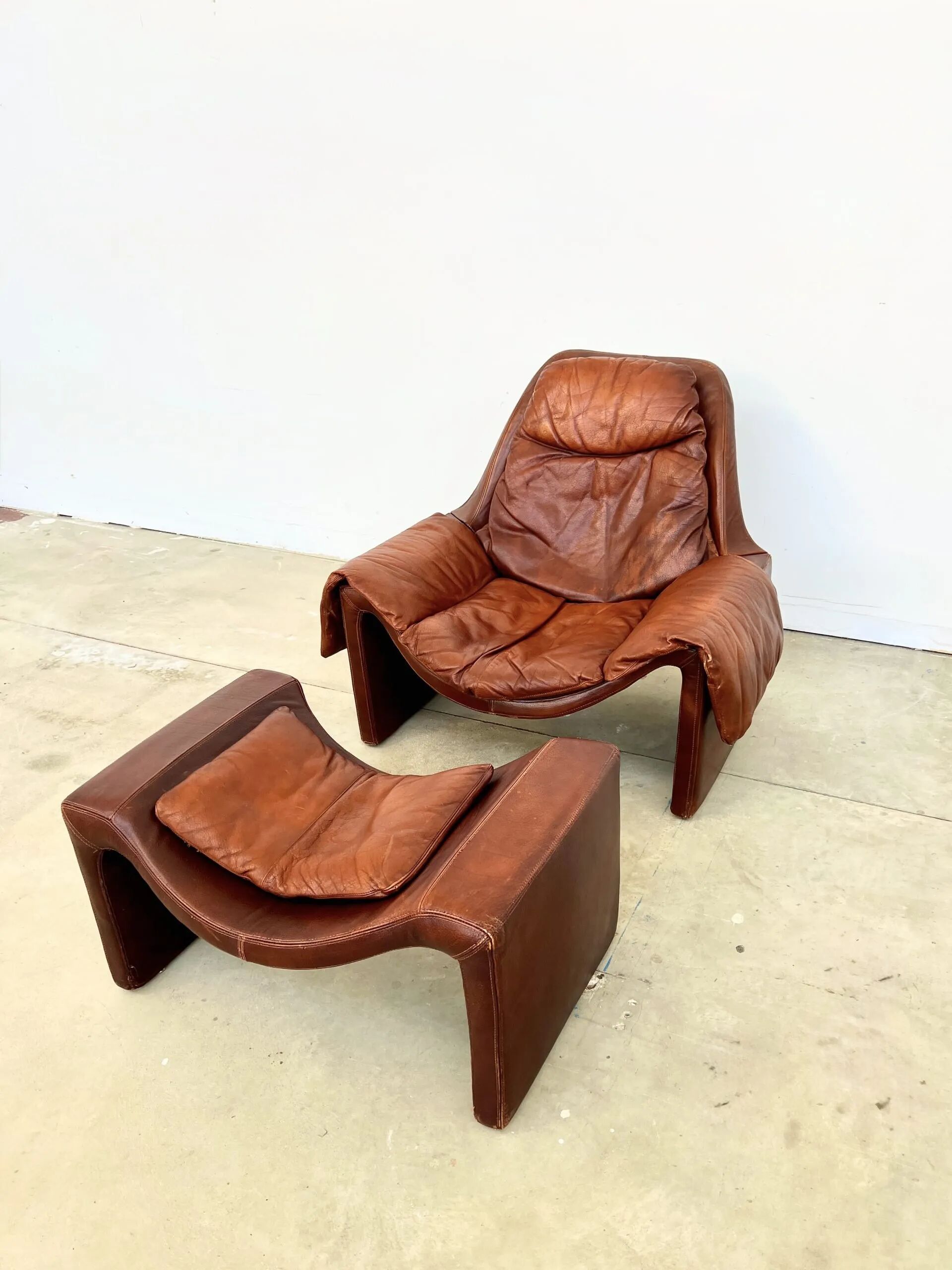 Havana leather armchair and ottoman P60