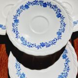 4 blue white saucers