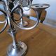 Ercuis pair of candlesticks model Cheverny in silver-plated metal with hunting horn decoration.