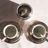 Silver-plated metal coffee service with a grape design.