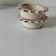 Duo of handmade beige and terracotta earthenware empty pockets