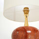 Pair of lamps in red travertine and brass 1970