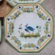 Set of 12 small antique plates by Alfred Renoleau, different designs.