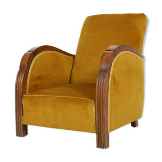 Art Deco armchair in mustard color