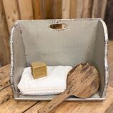 Old patinated washerwoman tray and its beater