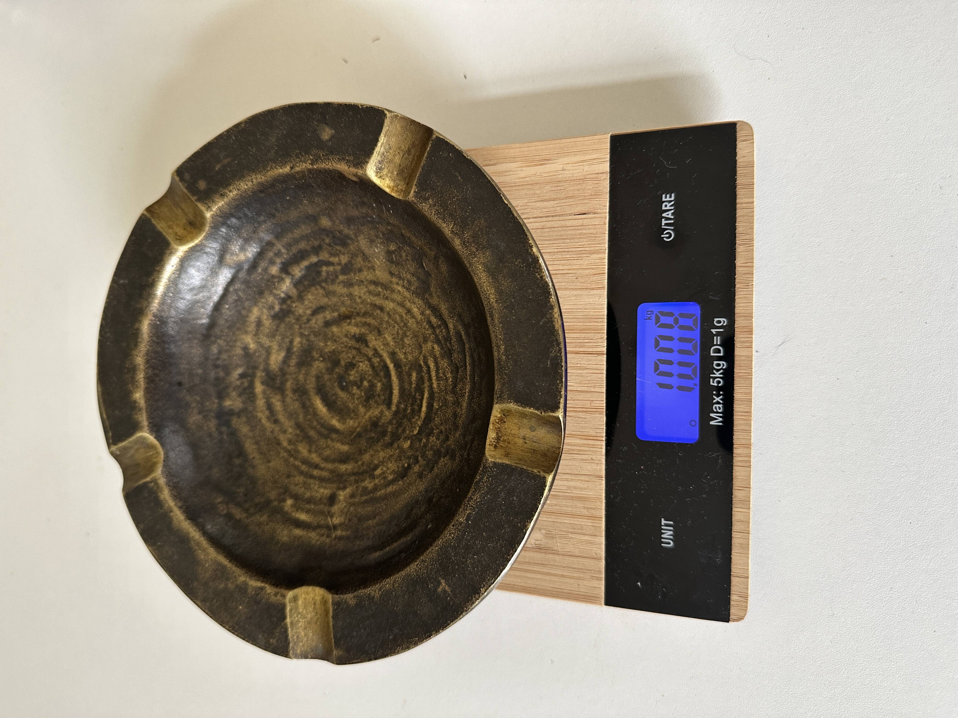 Vintage bronze ashtray design from the 60s