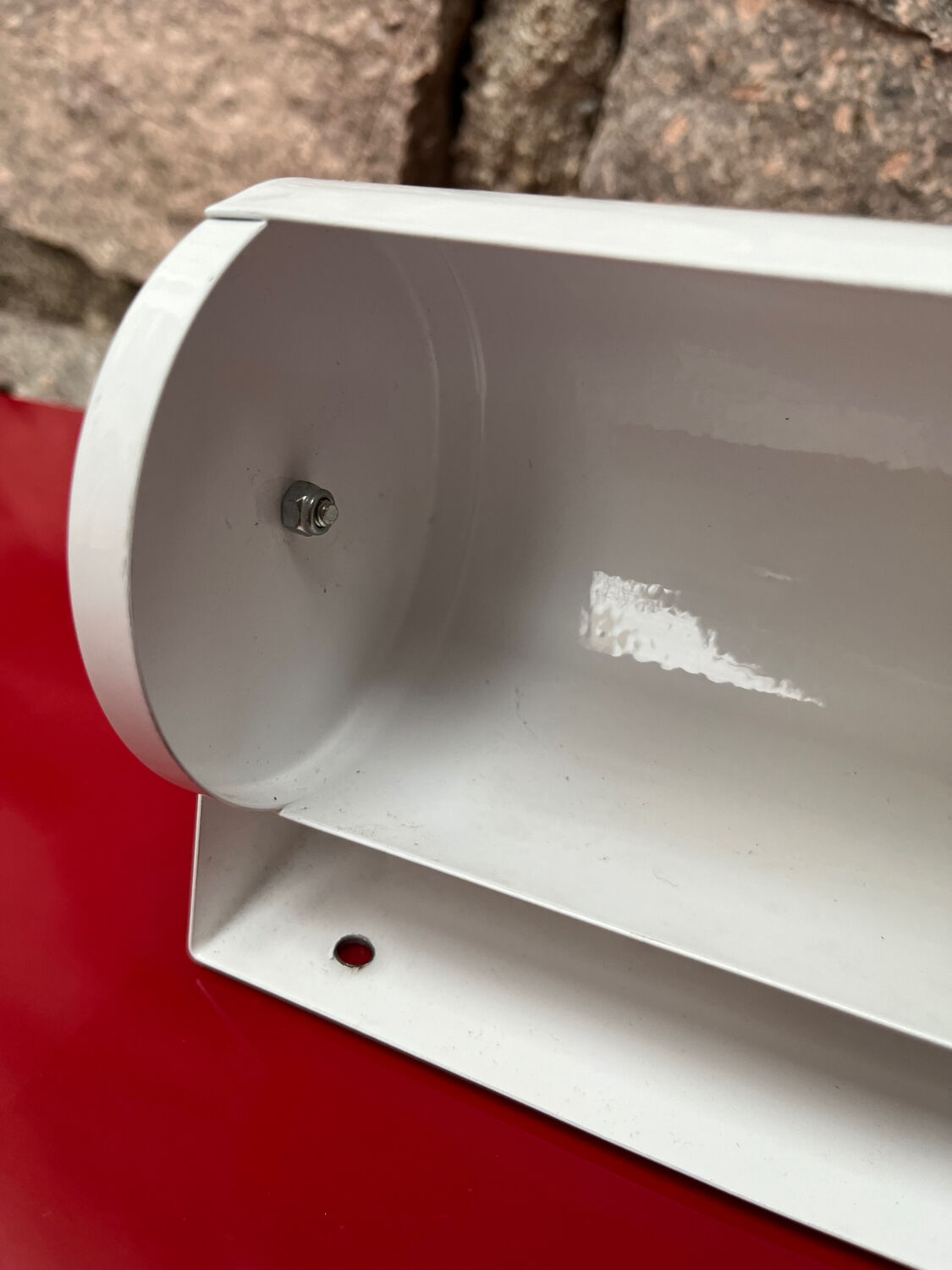 Metal wall light with shutter