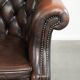 Brown cow leather Chesterfield office chair on wheels in English style
