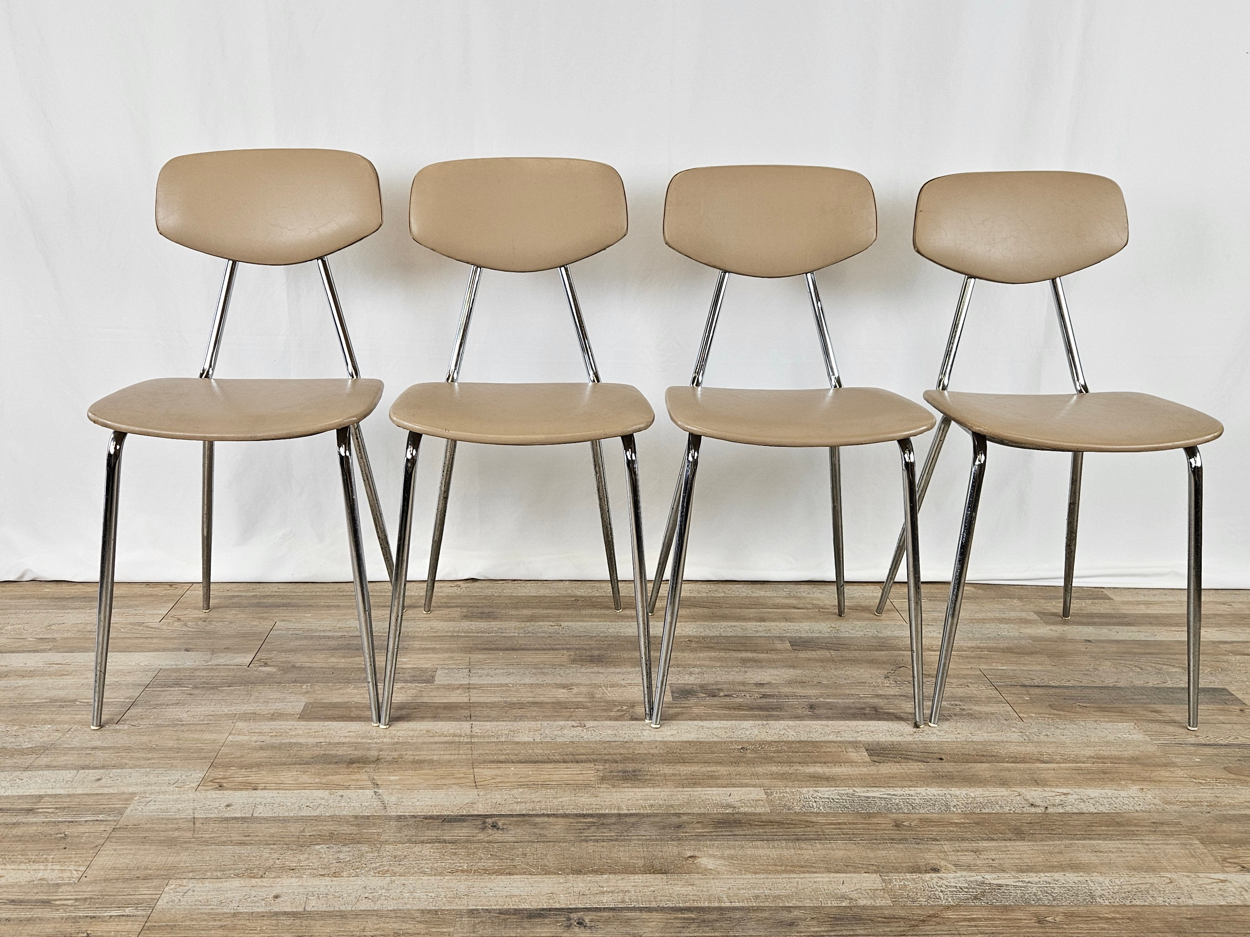 Set of four chairs in iron and skai 1970