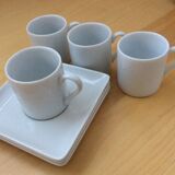 4 coffee cups and saucers