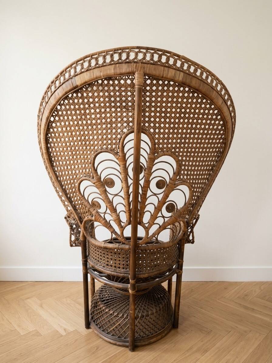 Vintage Emmanuelle armchair in woven rattan from the 1970s.