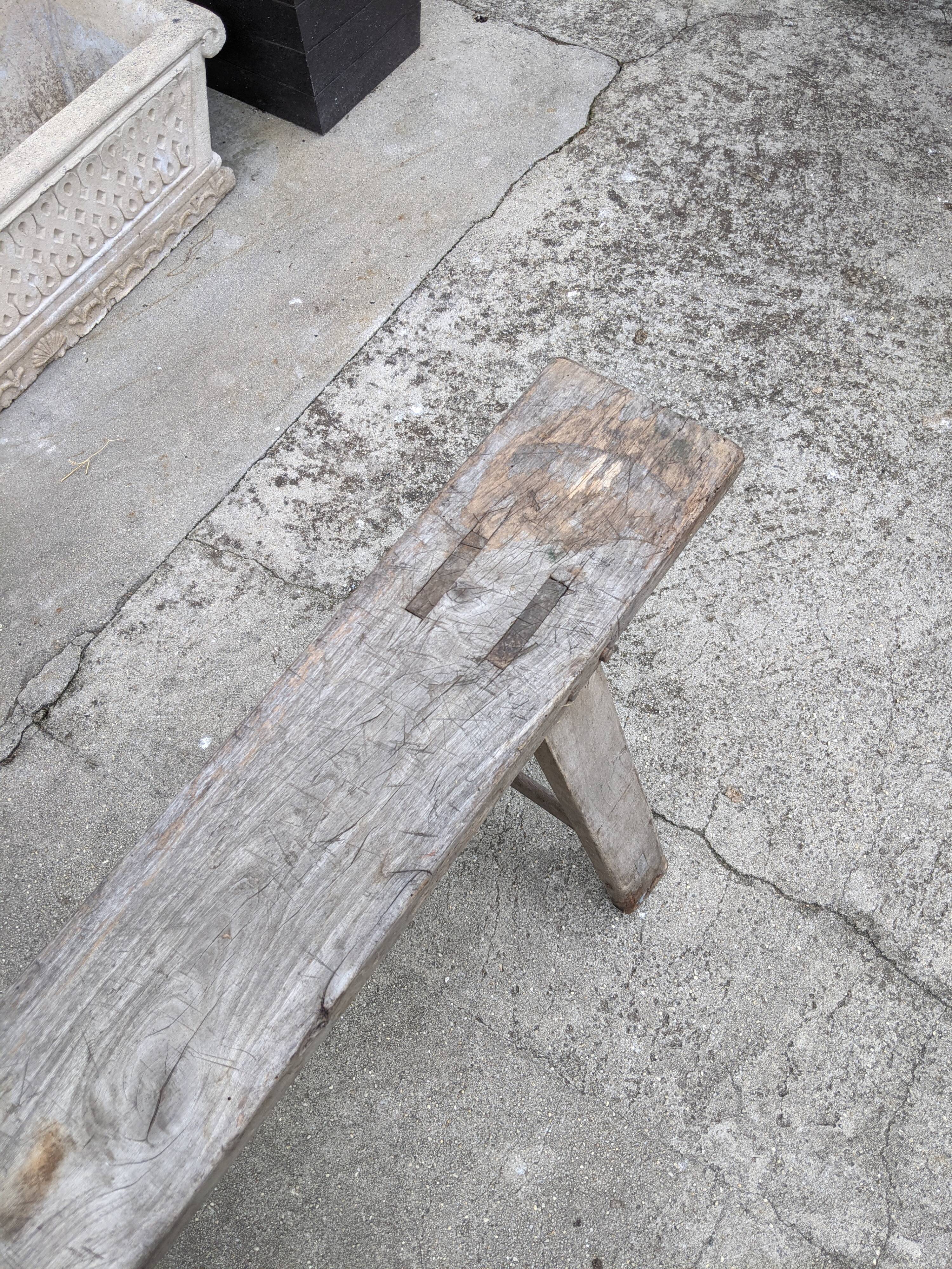 Old farm bench in chene