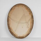 French Art Deco Oval gilded Mirror in Carved Wood, ca. 1920