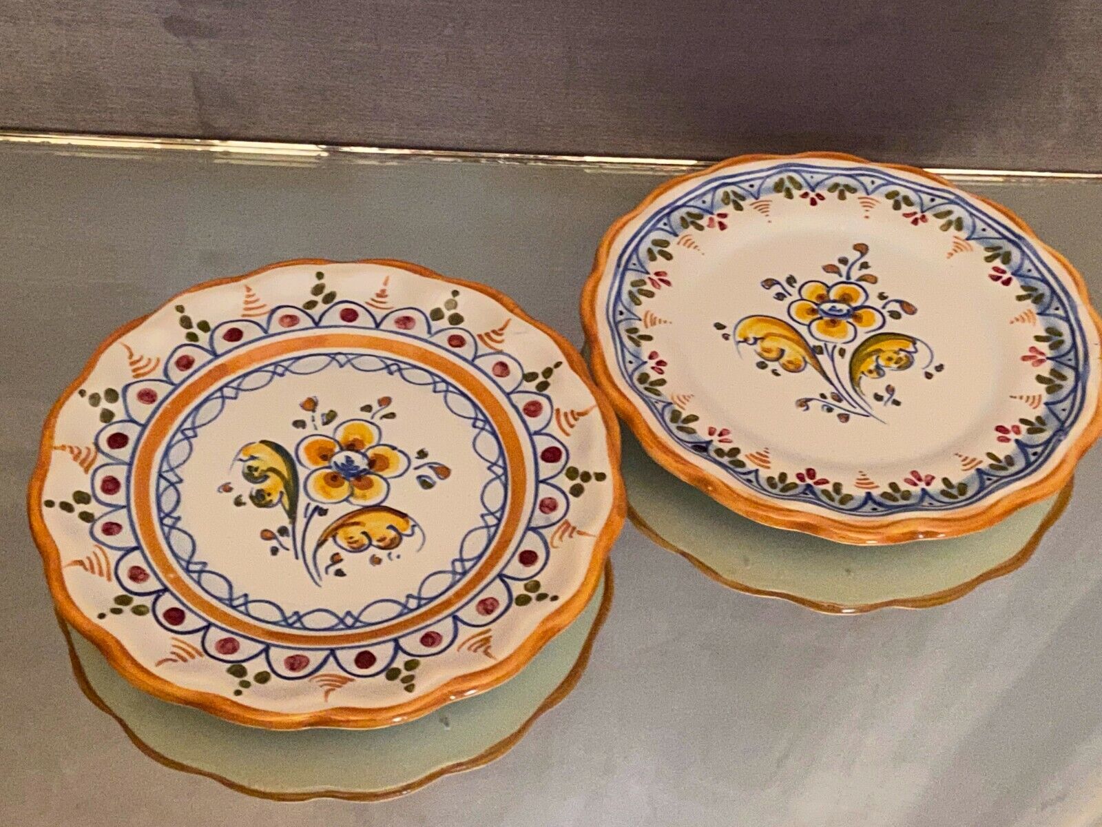 Pair of Talavera earthenware plates with floral decoration