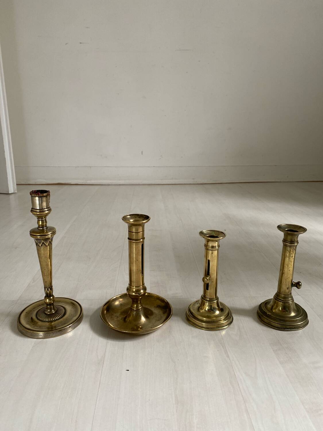 Set of 4 brass candle holders