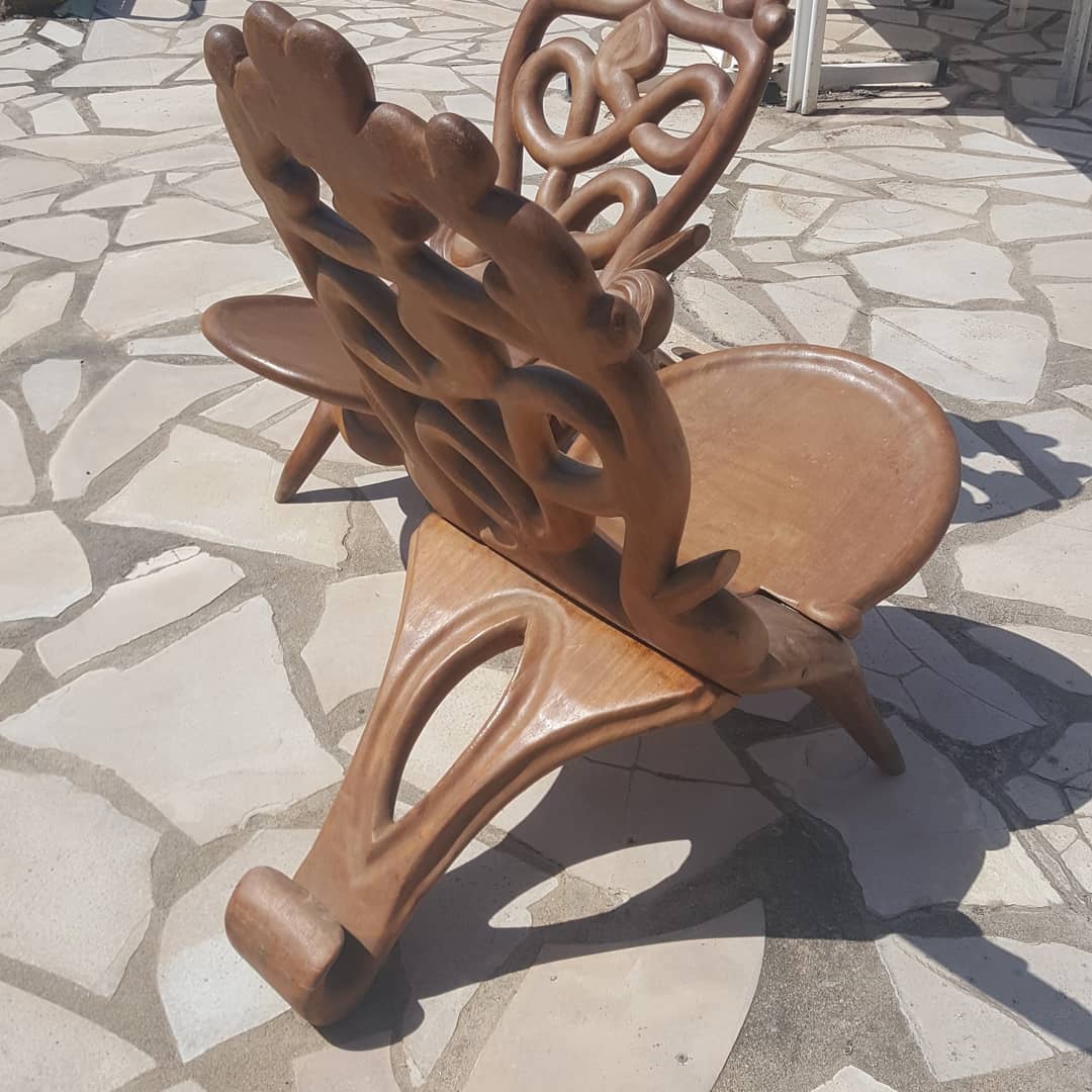Pair of solid mahogany armchairs from Madagascar, circa 1950