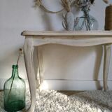 Old patinated coffee table and curved feet