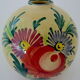 Vase "ball" decorated floral in polychrome earthenware glazed by Saint-Clement