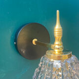 Gilded brass wall lamp and its colorful thick glass tulip