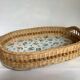 Old wicker basket tray with wooden beads.