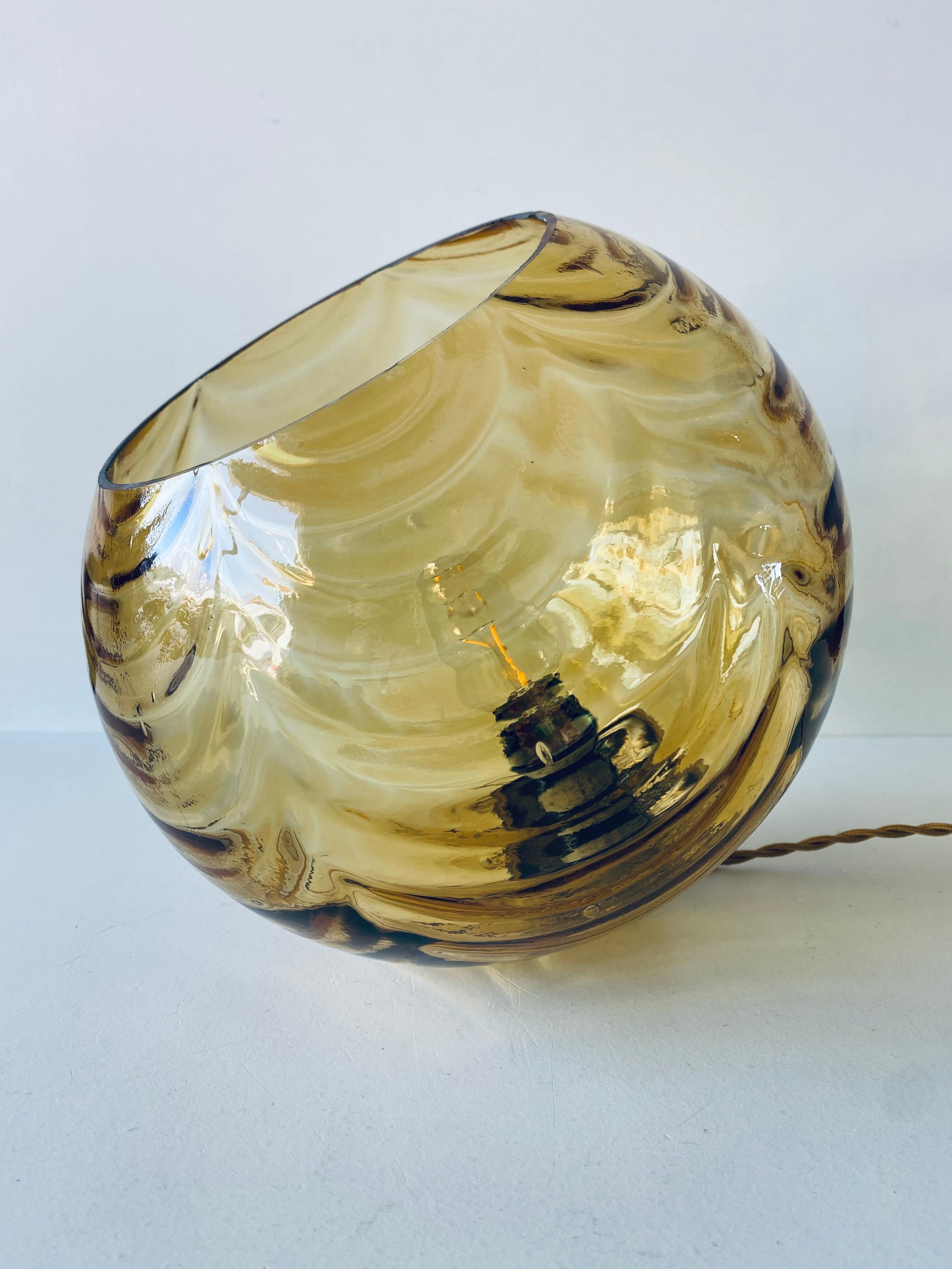 Amber glass ball suspension