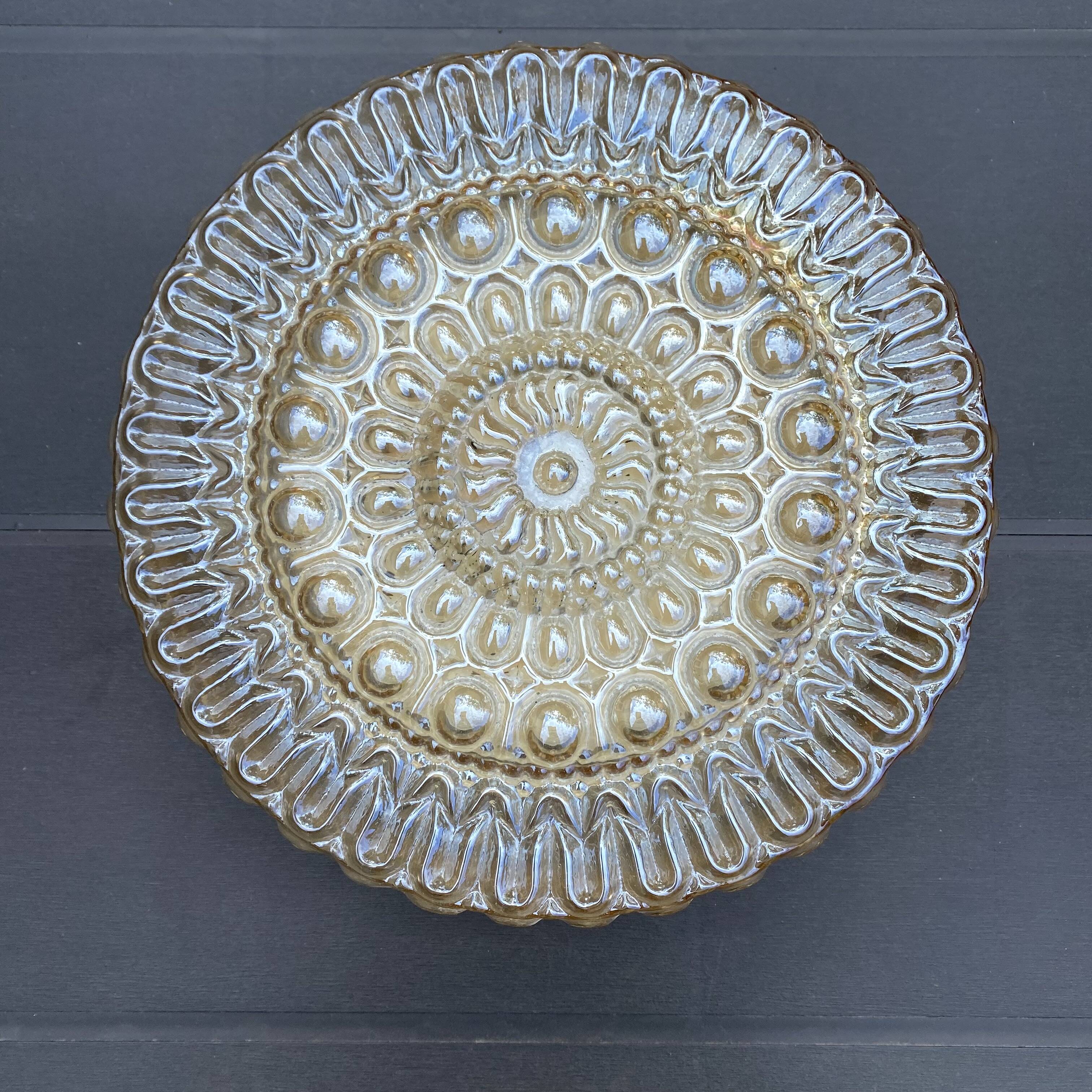 Vintage round ceiling light in amber glass