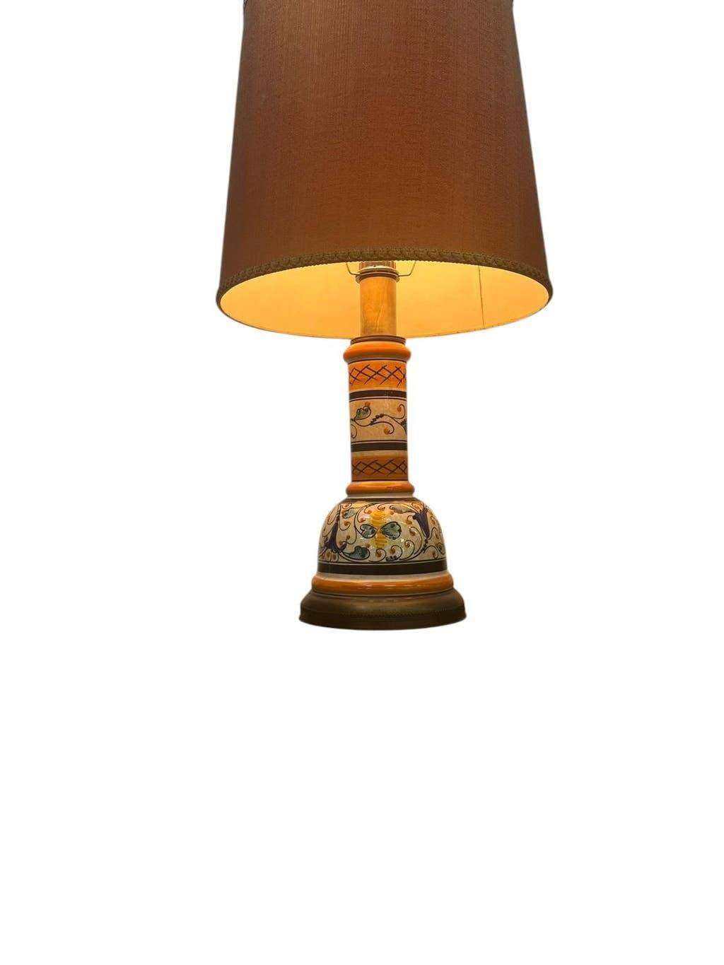 Vintage orange Portuguese table lamp with a ceramic base.