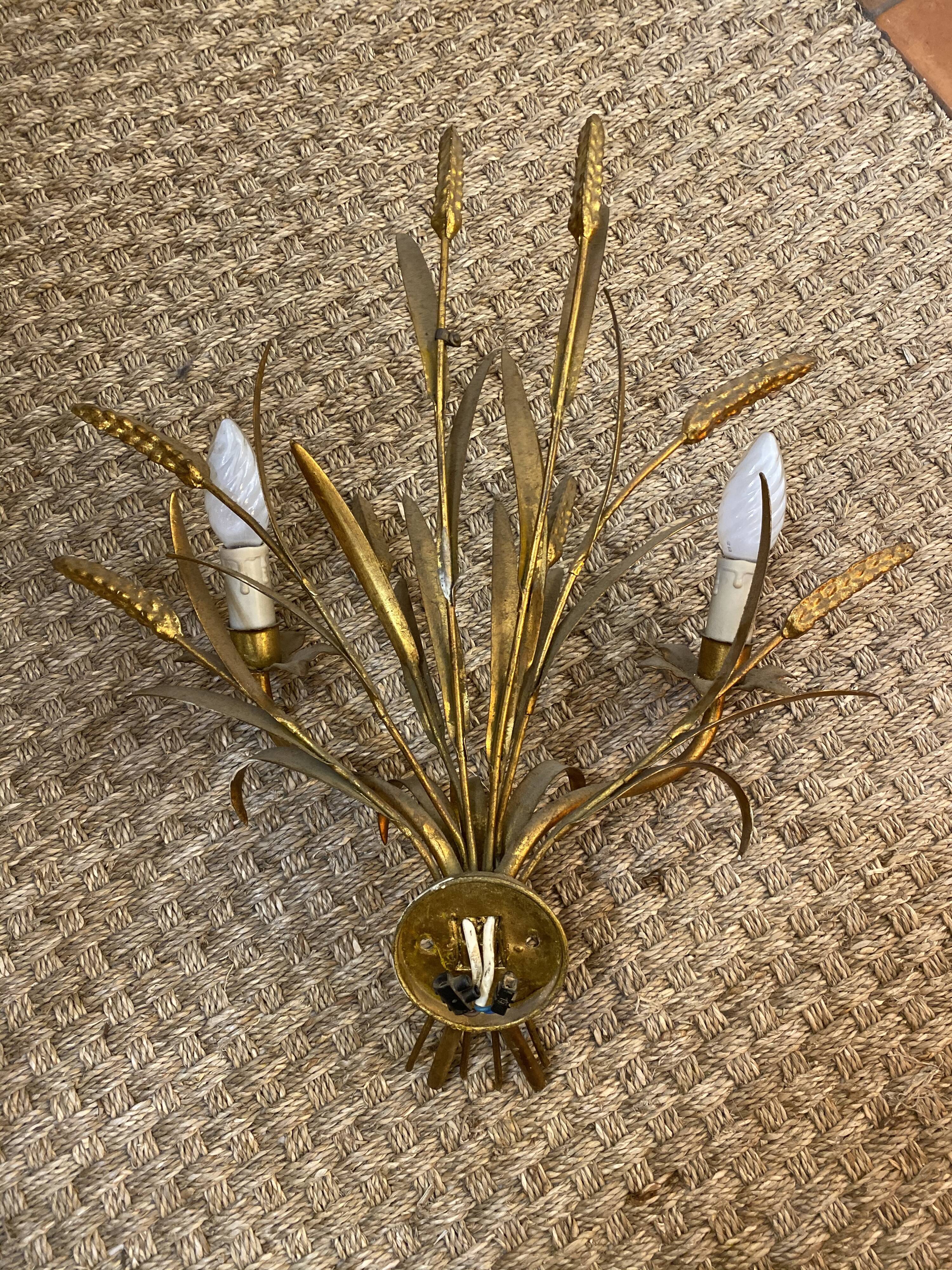Applique en métal doré 1960